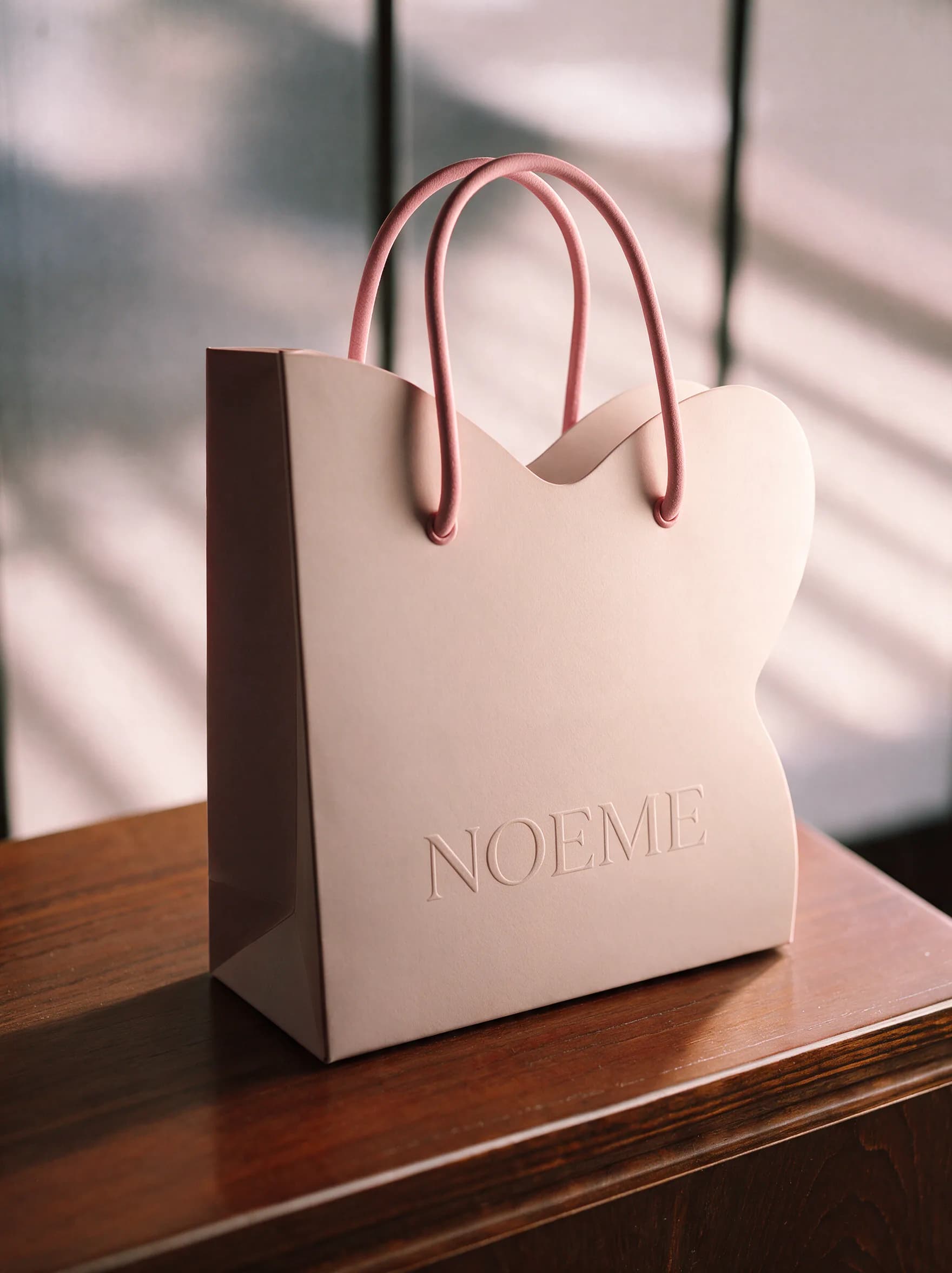 NOEME shopping bag with butterfly-wing silhouette